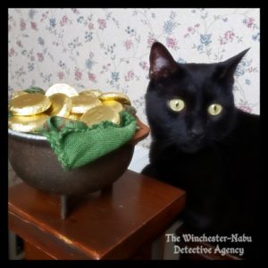 Gus and his pot of gold (gold coin chocolates in a cast iron cauldron)