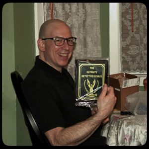 Joe with award